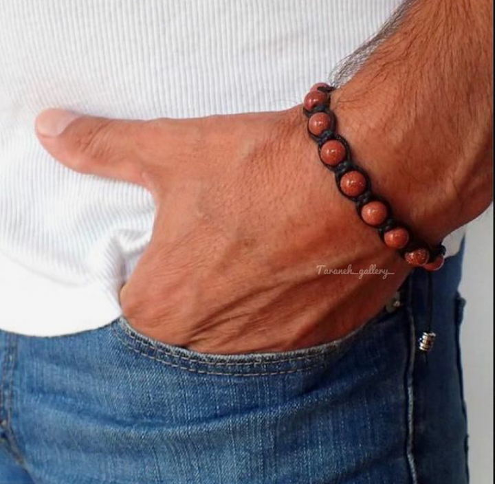 دستبند مردانه از سنگ چشم ببر وبافت چرمی عمده وتک